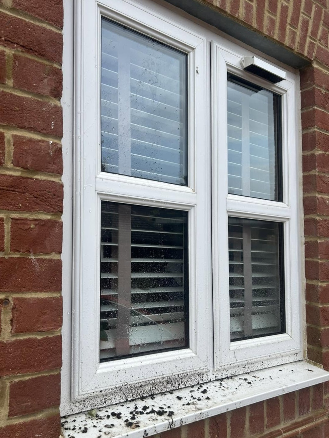 Window before EasyClean residential window cleaning