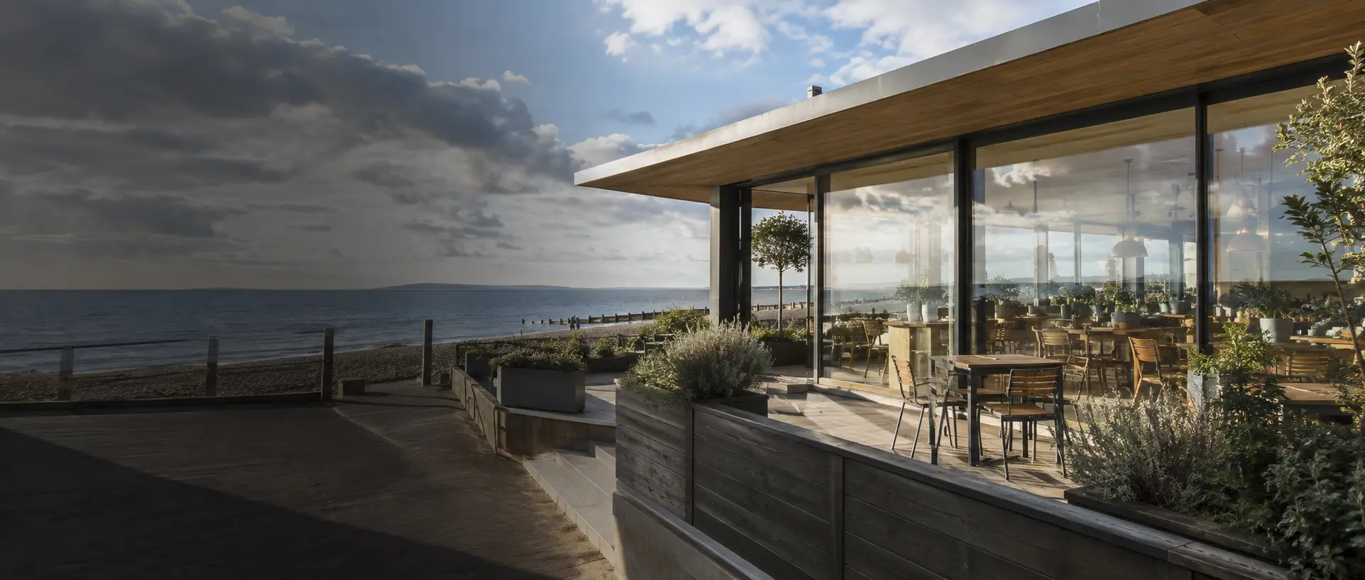 Illustrative coastal business with clean glass frontage on Hayling Island