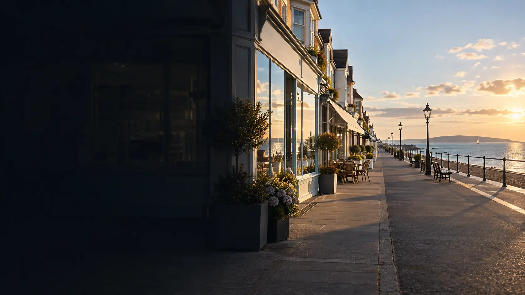 Illustrative seafront shopfront glazing and promenade in a Lee-on-the-Solent-style setting