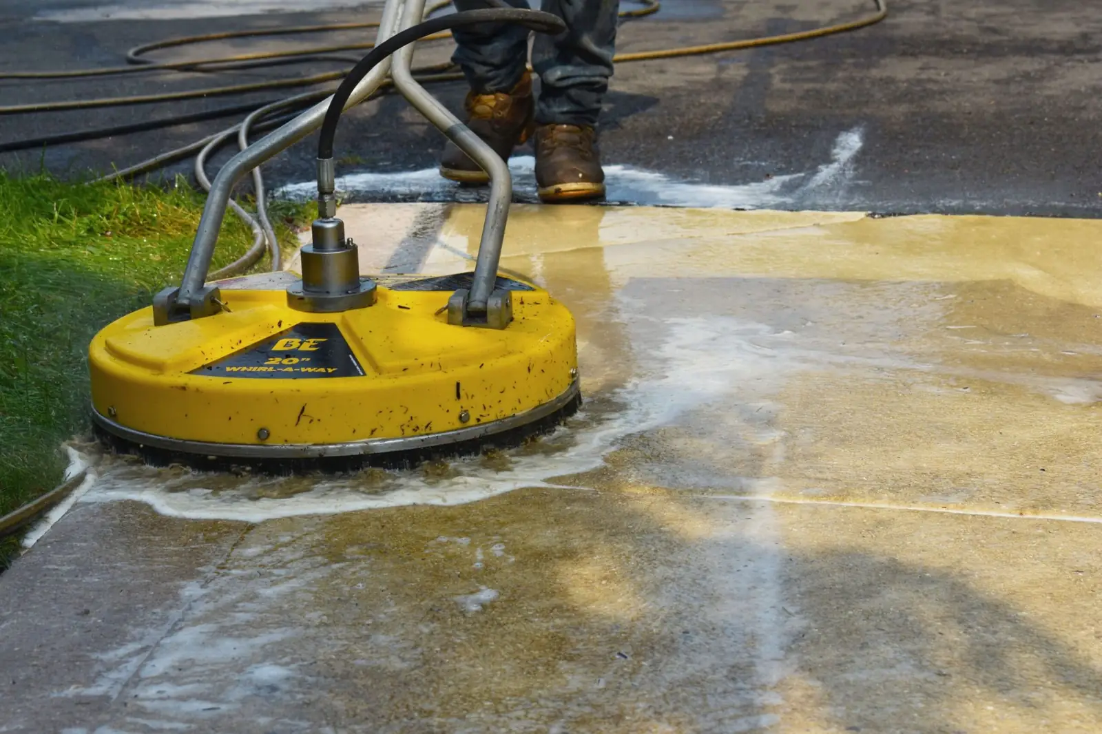 Professional pressure cleaning a driveway in Portsmouth