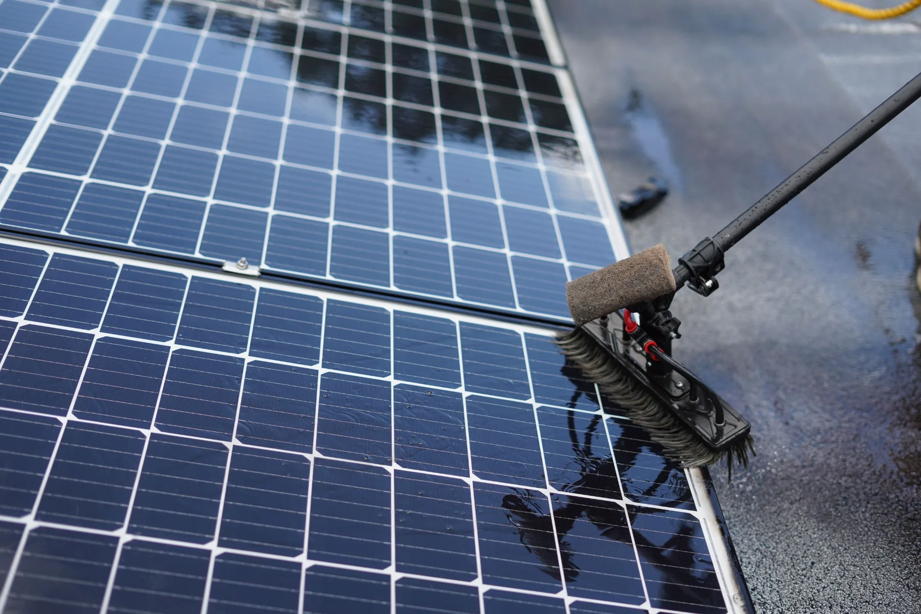 Solar panel cleaning Fareham using a soft brush and purified water